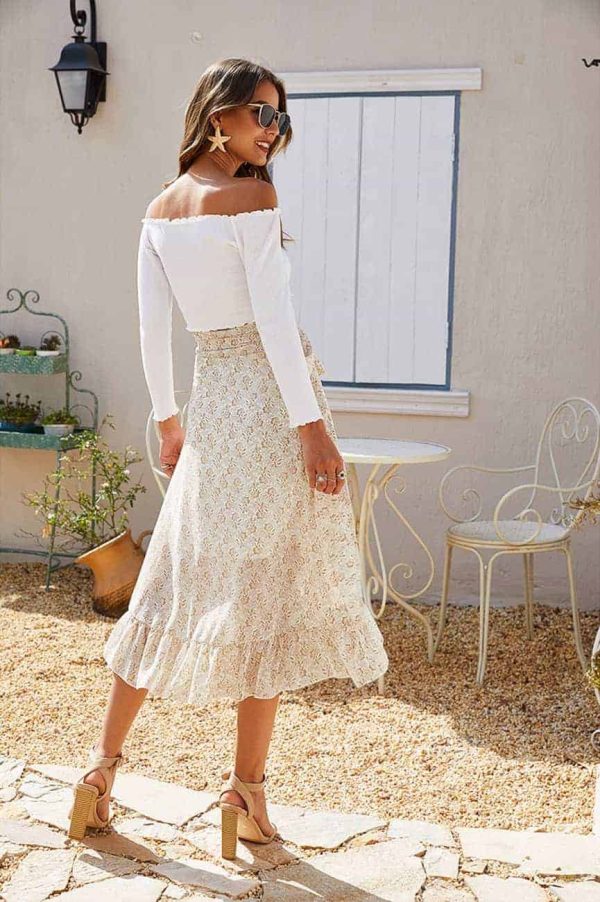 Jupe courte à fleurs beige vue de dos